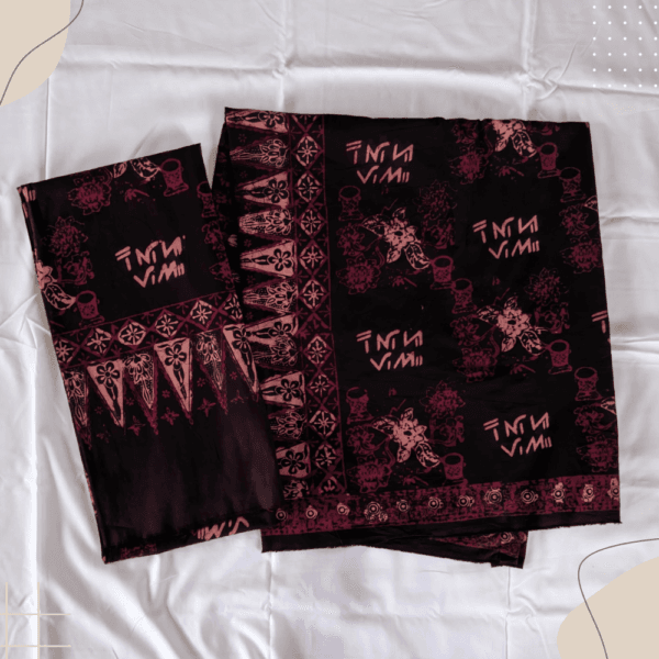 Batik motif Raflesia dan jangki dengan ponco pucuk rebung dan bis megalitik. dari toko online batikkerinci.com